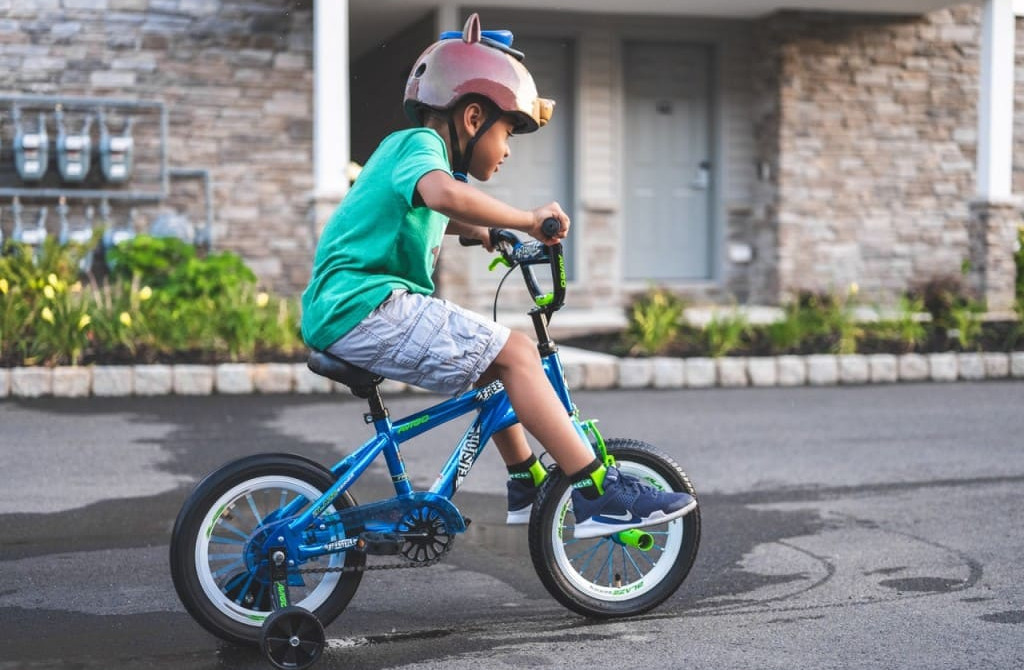Teaching your child to ride a scooter or bicycle